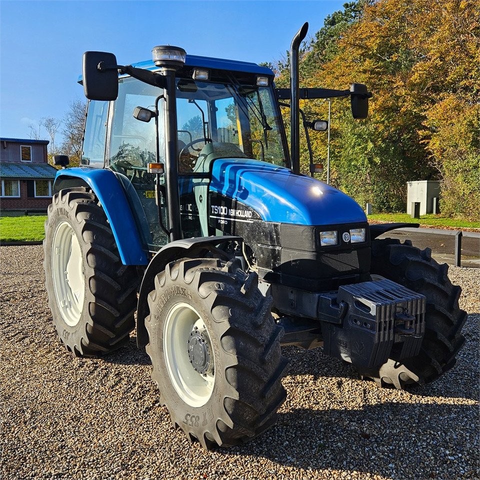 New Holland TS 100 Tracteur agricole New Holland TS 100 4x4 Diesel – Cabine – Image 1